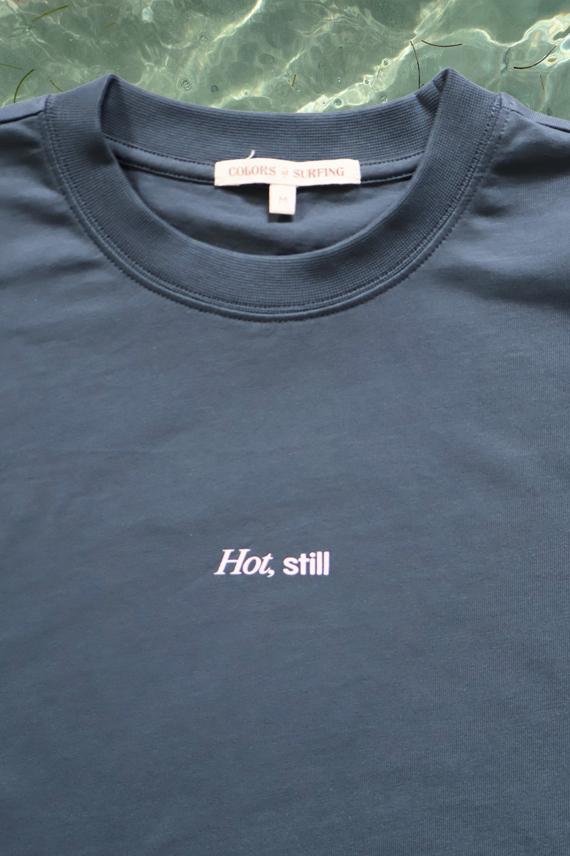 Hot, still · Tee